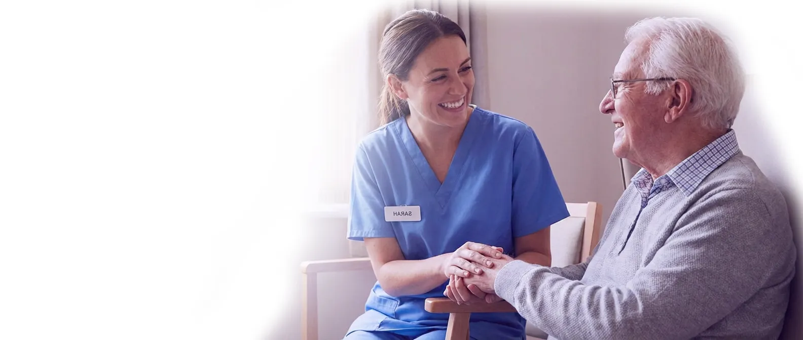 Caregiver assisting a client at home